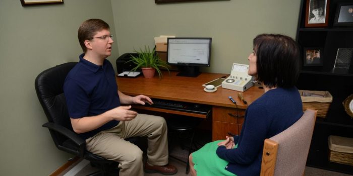 Dr Ted Talking with a Patient